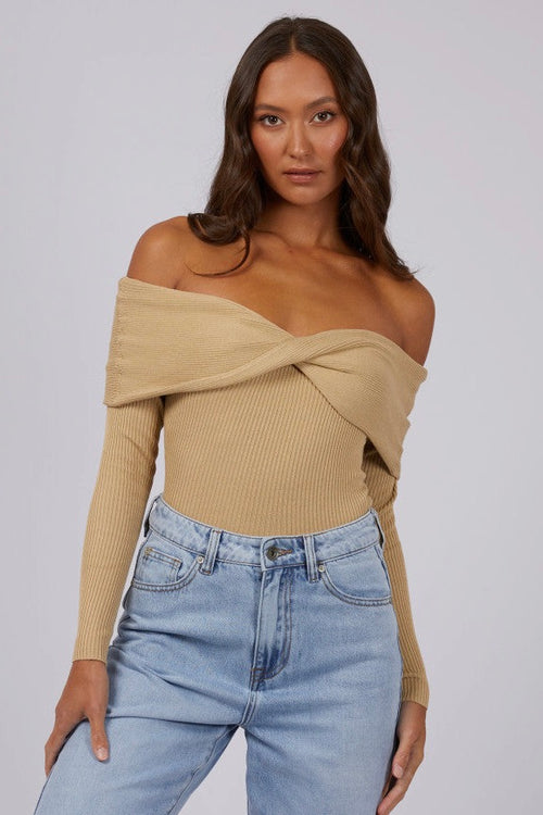 model wears Tan Off Shoulder Knit Top