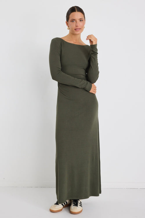 Model wears a khaki long sleeve maxi dress 