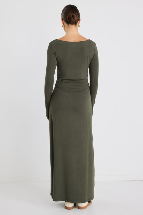 Model wears a khaki long sleeve maxi dress 