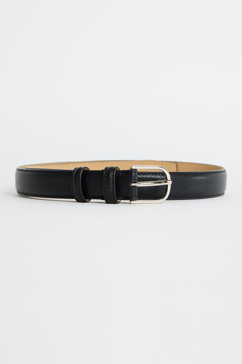 Slim black leather belt with a textured finish and a silver buckle, photographed on a white background