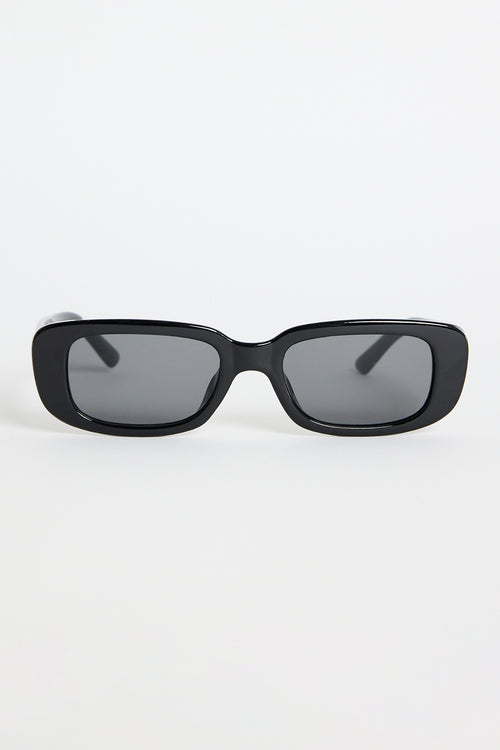Glossy black rectangular sunglasses with dark tinted lenses, photographed on a white background.