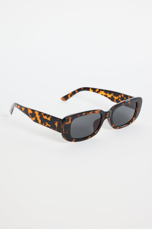 Rectangular brown tortoiseshell sunglasses with dark tinted lenses, photographed on a white background