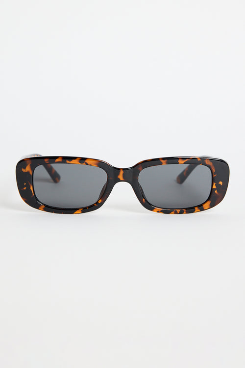 Rectangular brown tortoiseshell sunglasses with dark tinted lenses, photographed on a white background