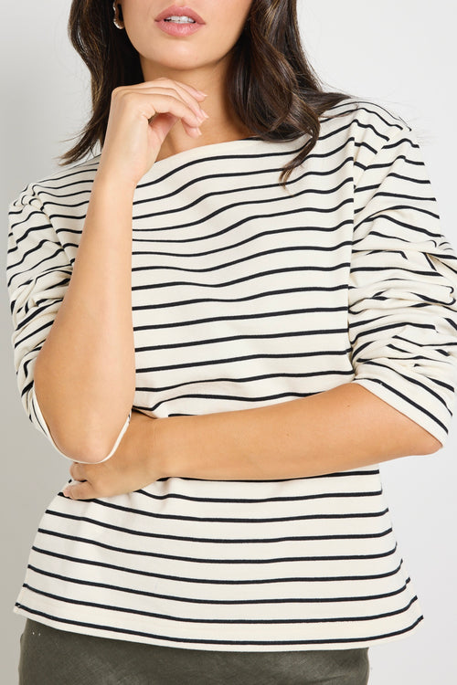 model wears stripe long sleeve black and white boat neck tee 