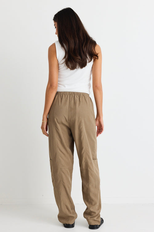 model wears a green cargo pant