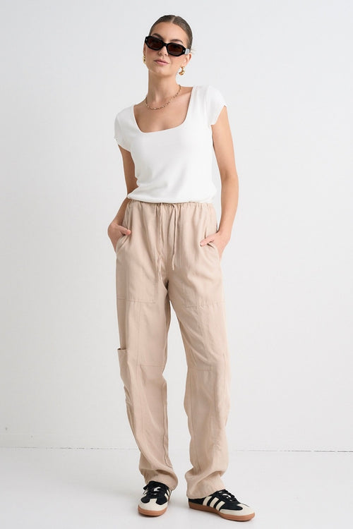 model wears Beige Cargo Pants