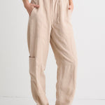 model wears Beige Cargo Pants