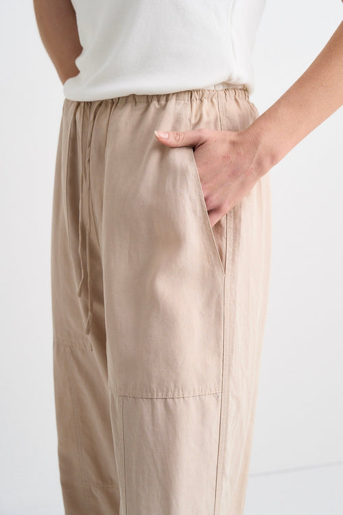 model wears Beige Cargo Pants