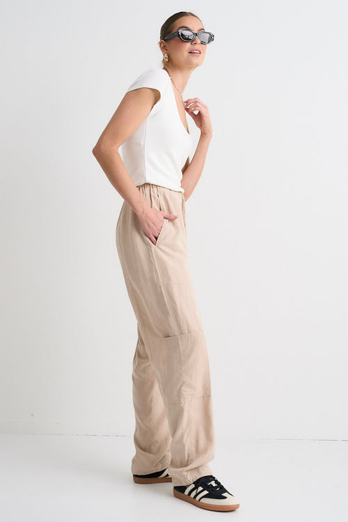 model wears Beige Cargo Pants