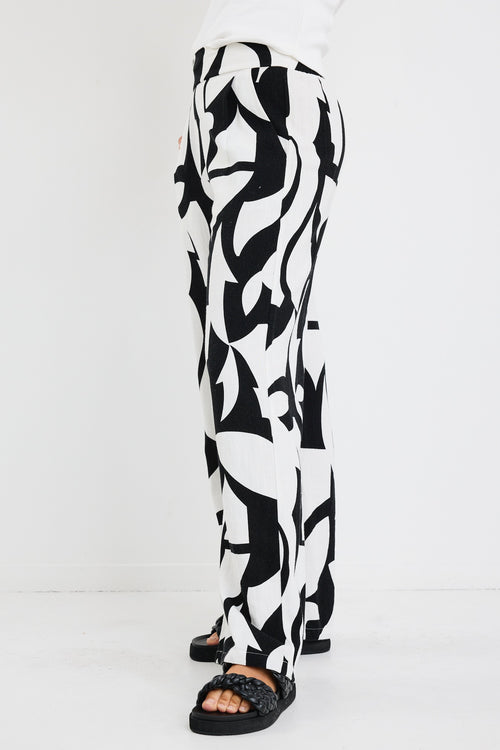 model wearing black white patterned pant