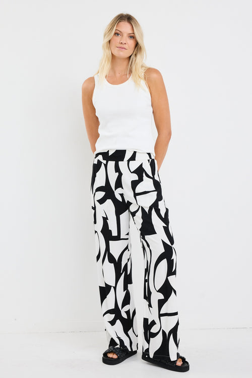 model wearing black white patterned pant