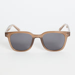 Translucent brown classic square sunglasses with dark tinted lenses, photographed on a white background.