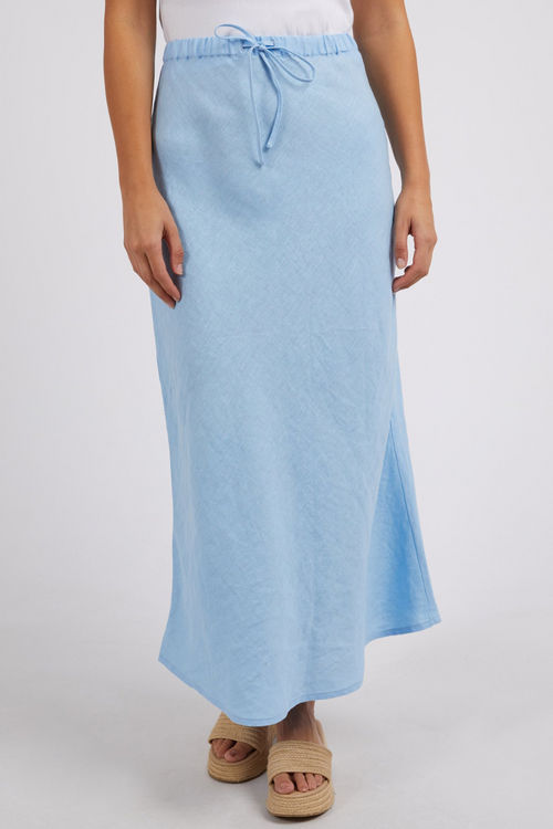 model wears blue linen maxi skirt