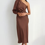 model wears a brown one shoulder midi dress