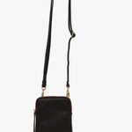 image shows black sling bag with zip by saben