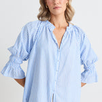 model wears a blue stripe blouse