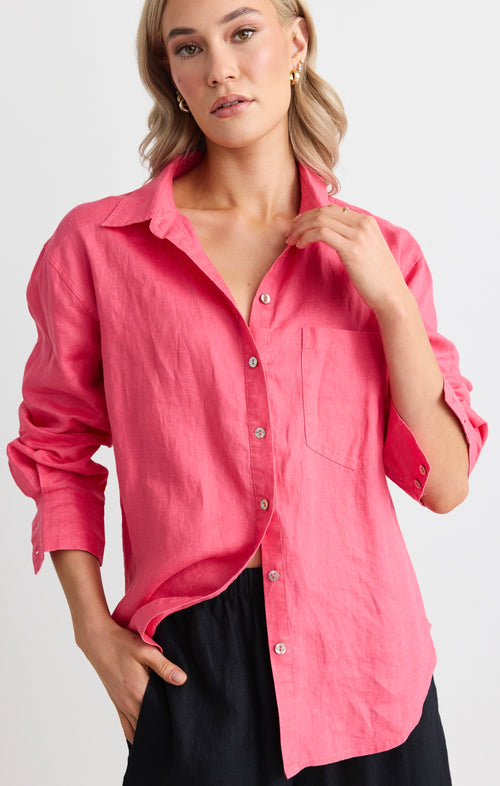 model wears a pink linen shirt 