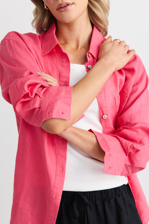 model wears a pink linen shirt 