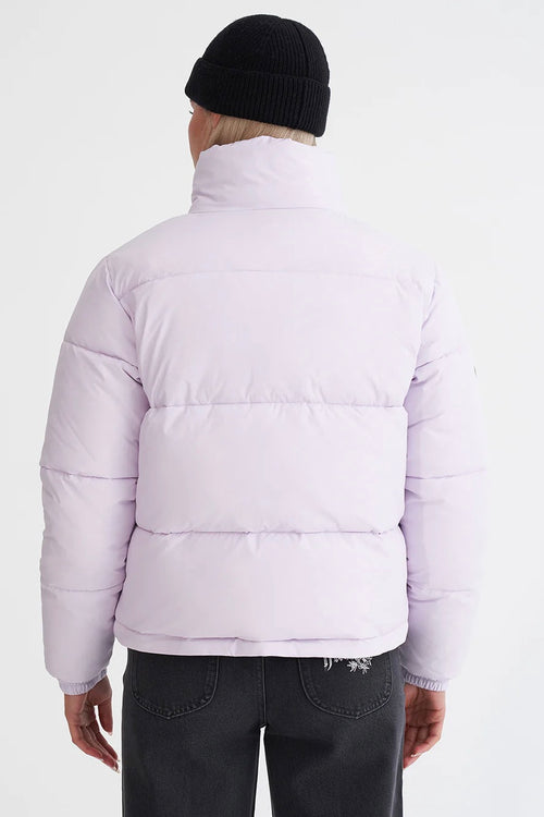 model wears a purple puffer jacket