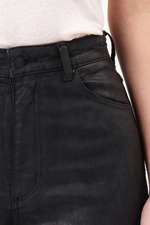 model wears black jeans