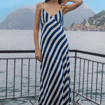 model wears navy and white stripe slip midi dress