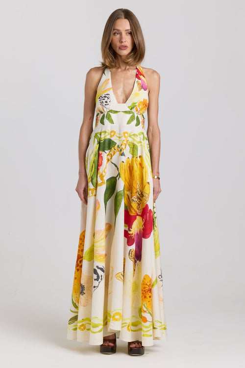 Woman wearing a floral dress on a white background