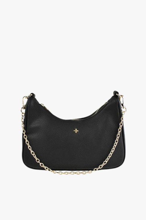 A small black vegan leather shoulder bag with a soft pebble texture, featuring a curved silhouette, gold-tone zip closure, and a short gold chain strap. The front of the bag is adorned with a subtle gold cross logo.