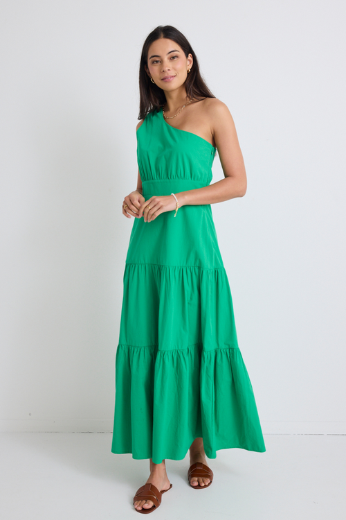 model wears tiered one shoulder green maxi dress