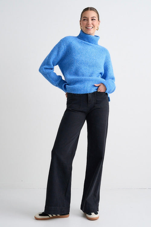 model wears a Blue Knit Jumper