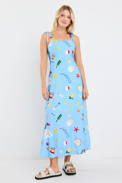 model wears a blue print midi dress