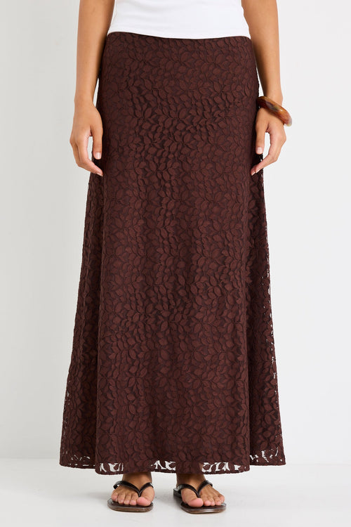 Woman wearing a chocolate lace maxi skirt