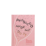 Book titled 'Prosecco Made Me Do It' with pink cover and text on a white background