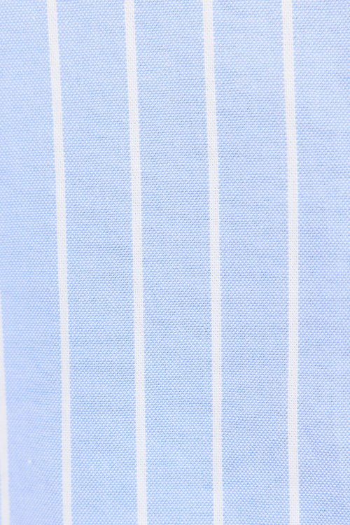 Close-up of light blue fabric with white vertical stripes