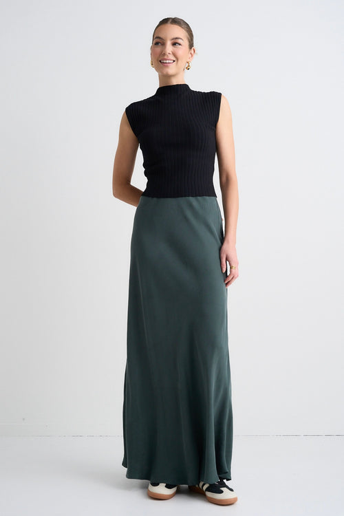 model wears a Green Midi Skirt