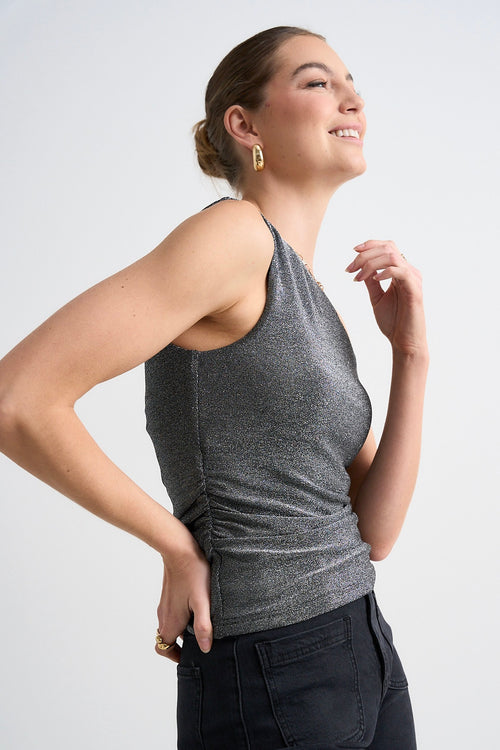 model wears Silver One Shoulder Top