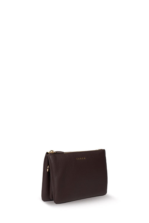 Black cardholder with Gucci logo pattern on a white background