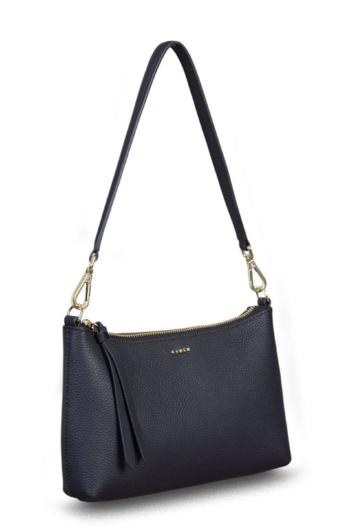 Black handbag with a strap on a white background