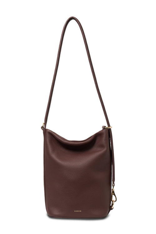 Brown leather shoulder bag on a white background