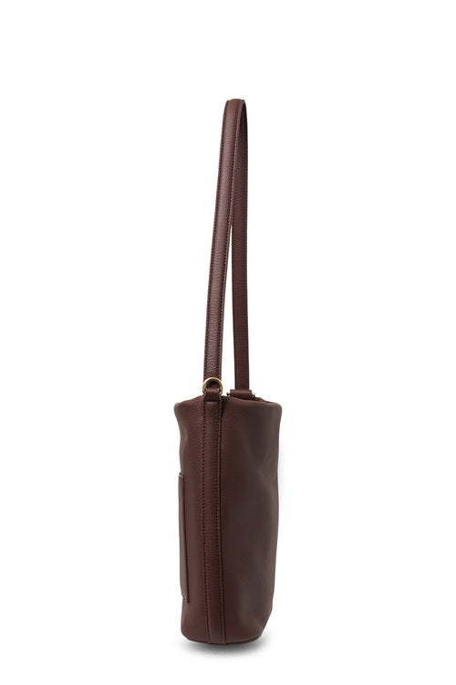 Brown handbag with a strap on a white background