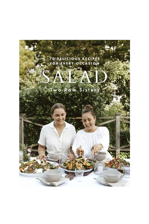 Book cover of 'Salad' by Two Raw Sisters with two women at a table outdoors.