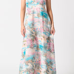 model wearing pink blue print long dress