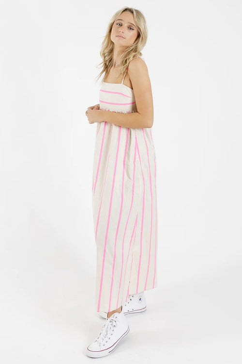 model wears a stripe pink and white dress 