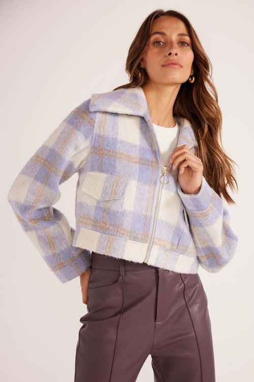 model wears a Blue Check Cropped Jacket