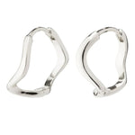 Pair of silver hoop earrings on a white background