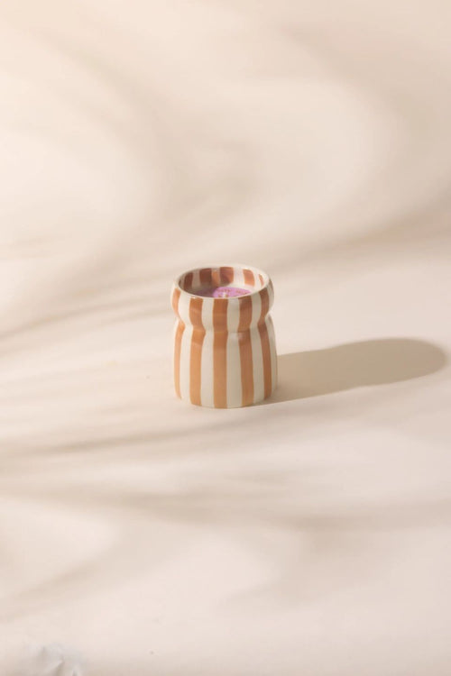 orange white striped candle