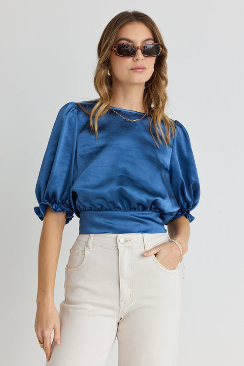 model wears Blue Satin Short Sleeve Top