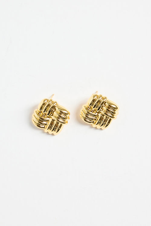 gold-plated brass stud earrings with an interwoven square design, photographed flat on a white background.