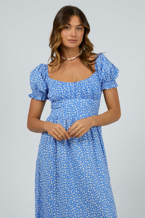 model wears a blue spot maxi dress