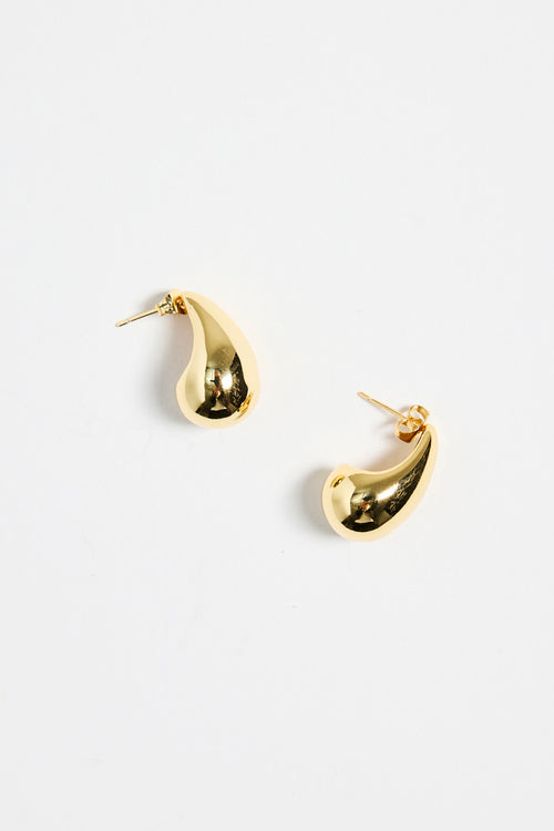 gold-plated brass stud earrings with a smooth, teardrop shape