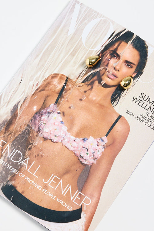 gold-plated brass stud earrings with a smooth, teardrop shape